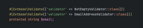 Screenshot of a code snippet showing two PHP attributes to configure validators for an email proerty